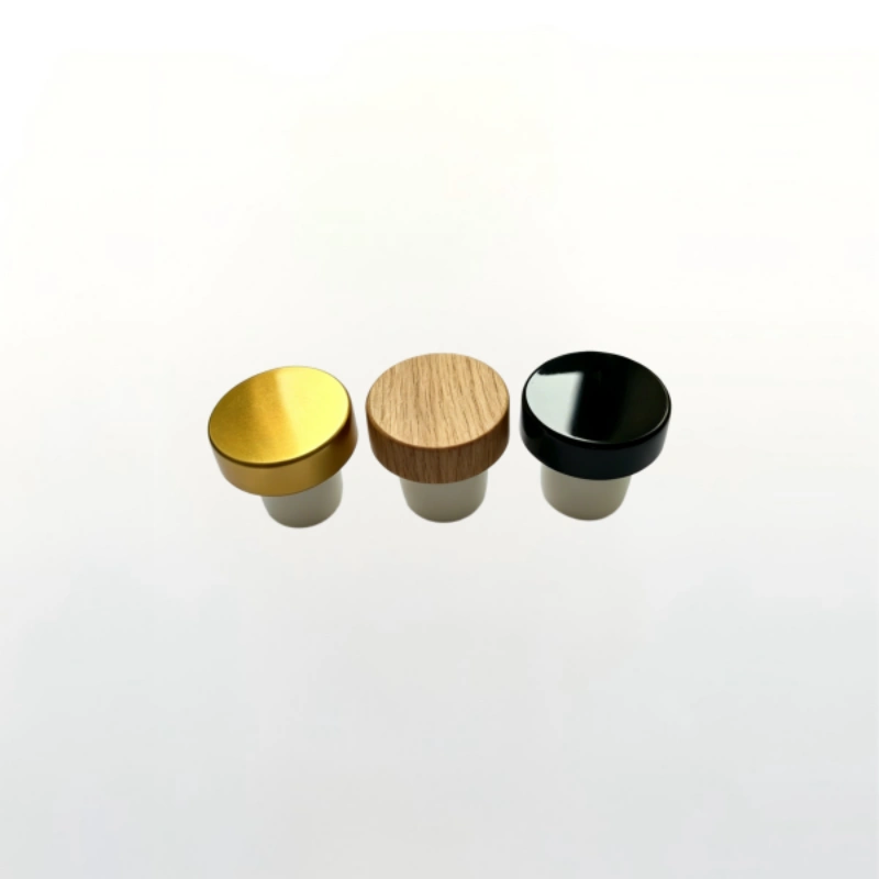 Three deluxe T-top bottle stoppers in gold wood grain and glossy black finish