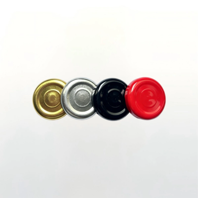 Top view of multi color metal snap on bottle caps in gold silver black and red